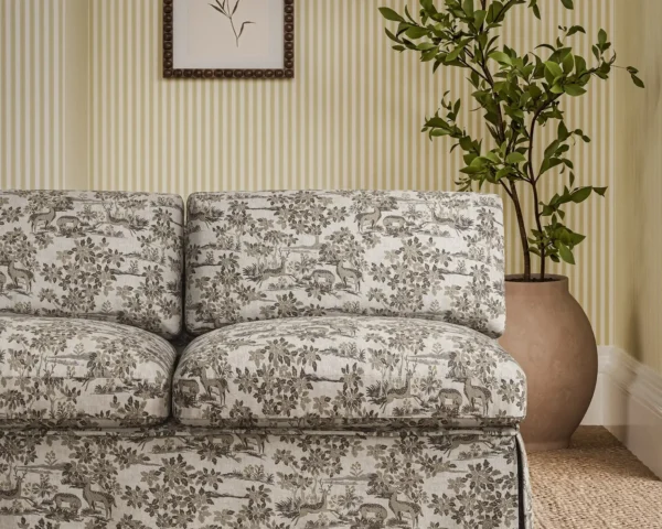 brown botanical sofa with plants