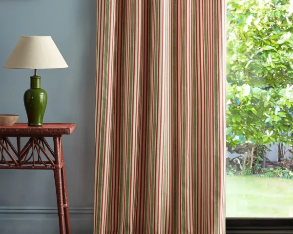 Barneby Stripe Fabric - Berry / Leaf by red striped curtain with side table and lamps