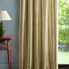 yellow striped curtain with side table and lamps