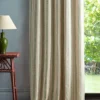 orange striped curtain with side table and lamps