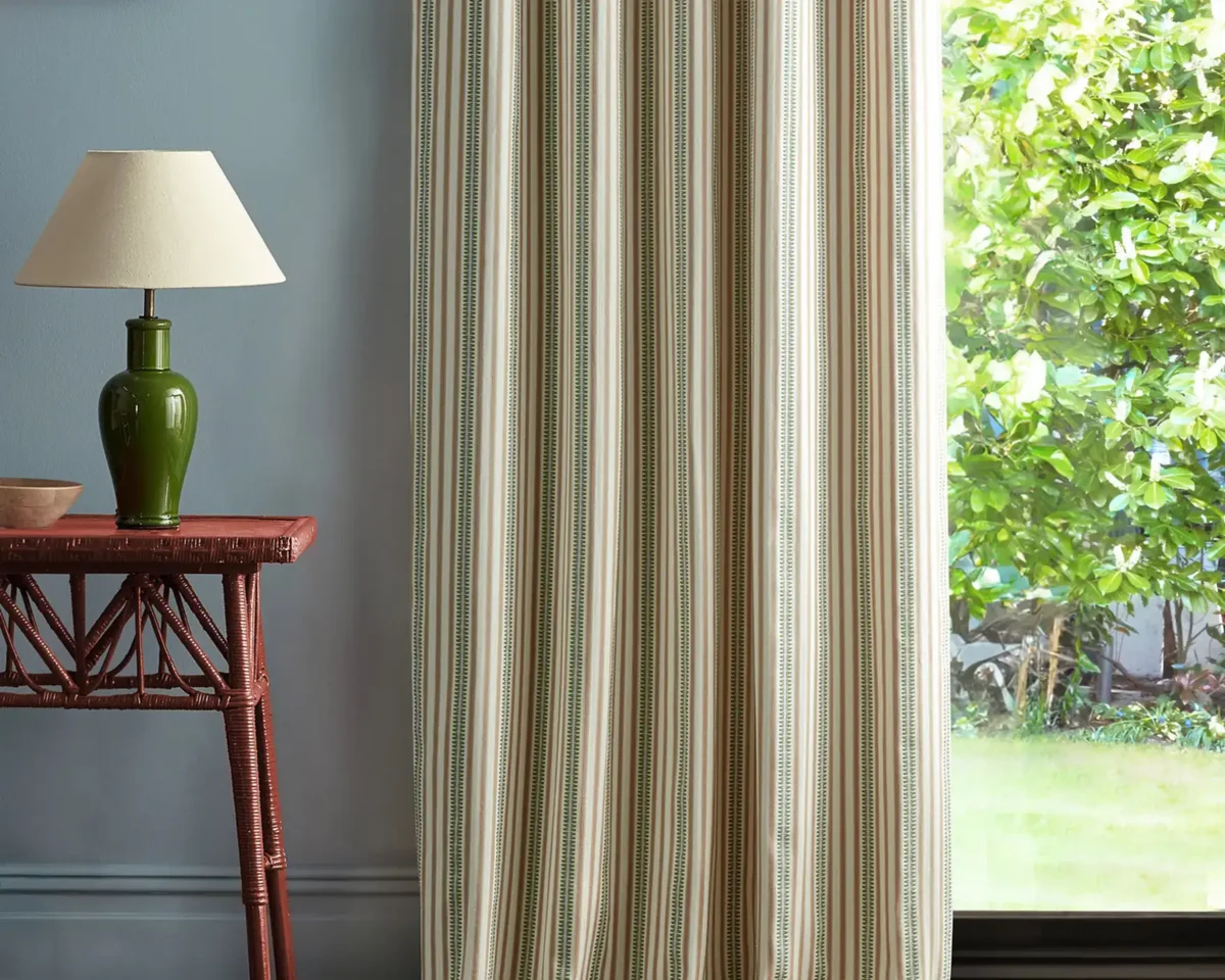 Barneby Stripe Fabric - Mallow / Olive by orange striped curtain with side table and lamps