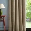 neutral striped curtain with side table and lamps