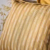 yellow striped cushion with sofa