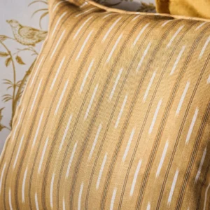 yellow striped cushion with sofa