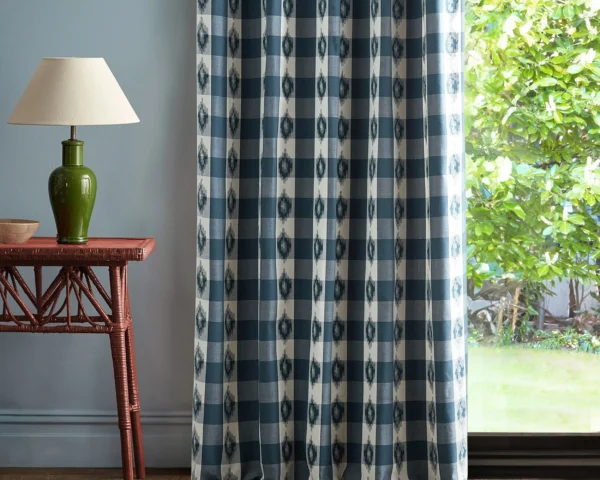 Odisha Check Fabric - Indigo / Madder by blue checked curtain with side table and lamps