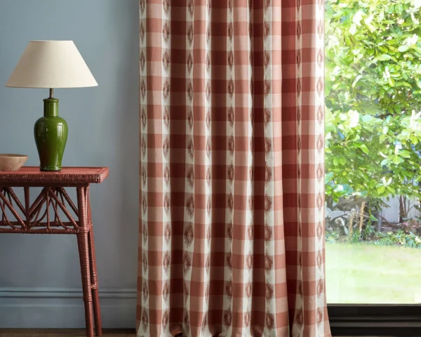 Odisha Check Fabric - Coral by red checked curtain with side table and lamps