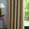 neutral striped curtain with side table and lamps