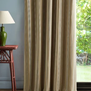 neutral striped curtain with side table and lamps