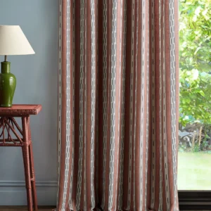 red striped curtain with side table and lamps
