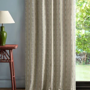 neutral striped curtain with side table and lamps