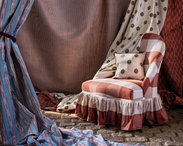 blue striped curtain with side table and lamps