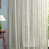 blue striped curtain with side table and lamps