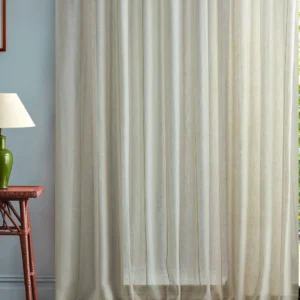 neutral striped curtain with side table and lamps
