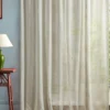 neutral striped curtain with side table and lamps