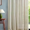 white misc curtain with side table and lamps