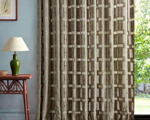 Sandcut Fabric - Driftwood by blue misc curtain with side table and lamps