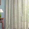 neutral striped curtain with side table and lamps