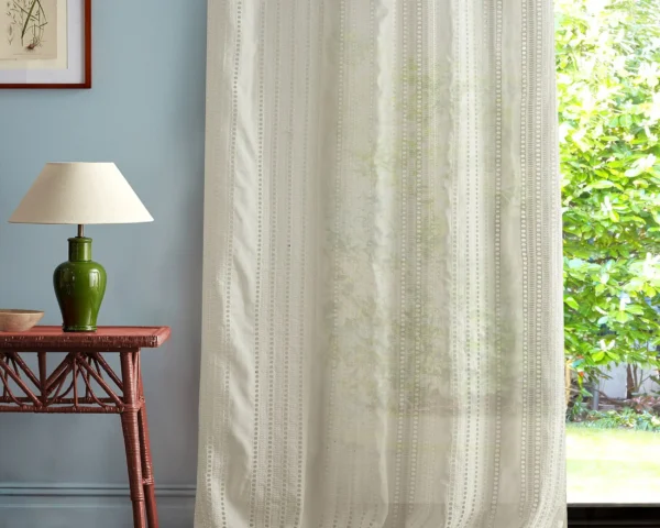 neutral misc curtain with side table and lamps