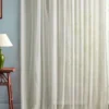 white plain curtain with side table and lamps