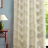 neutral botanical curtain with side table and lamps