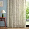 multicolour striped curtain with side table and lamps