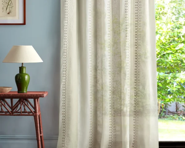 multicolour misc curtain with side table and lamps