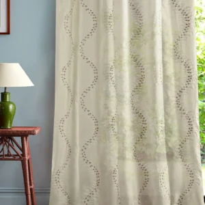 multicolour botanical curtain with side table and lamps
