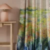 multicolour botanical curtain with side table and lamps
