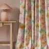 multicolour contemporary curtain with side table and lamps