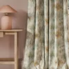 neutral contemporary curtain with side table and lamps