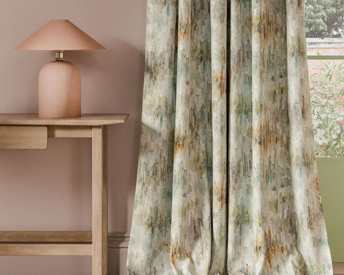 neutral contemporary curtain with side table and lamps