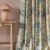 blue animal curtain with side table and lamps