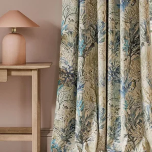 blue animal curtain with side table and lamps