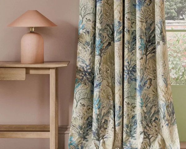 Oceana Print Fabric - Denim by blue animal curtain with side table and lamps