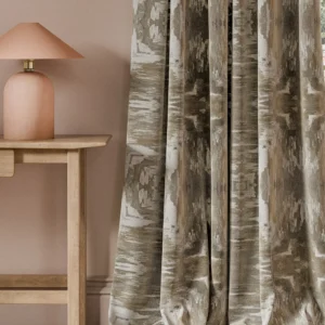neutral contemporary curtain with side table and lamps