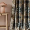 blue contemporary curtain with side table and lamps