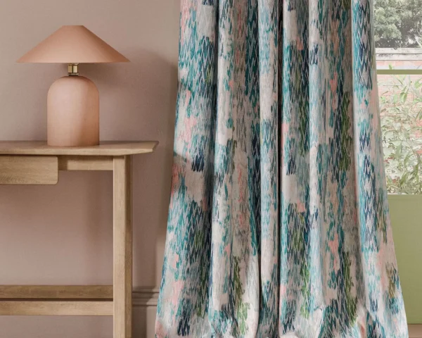 pink contemporary curtain with side table and lamps