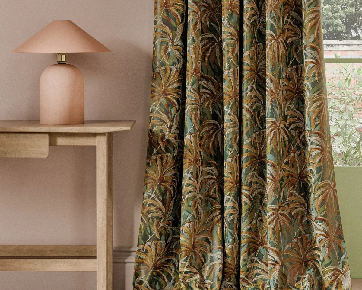 green botanical curtain with side table and lamps