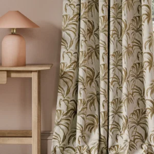 neutral botanical curtain with side table and lamps
