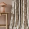 neutral contemporary curtain with side table and lamps