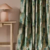 blue contemporary curtain with side table and lamps
