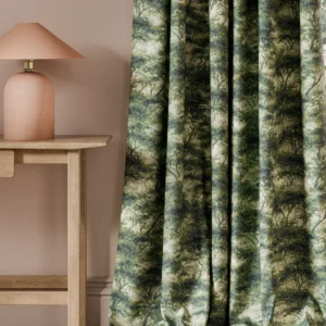 green botanical curtain with side table and lamps