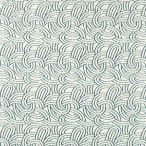 blue contemporary embroideried fabric from Clarke & Clarke
