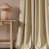 neutral contemporary curtain with side table and lamps