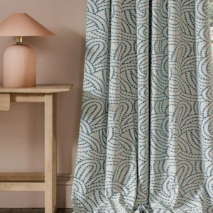 blue contemporary curtain with side table and lamps