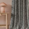 black-grey contemporary curtain with side table and lamps
