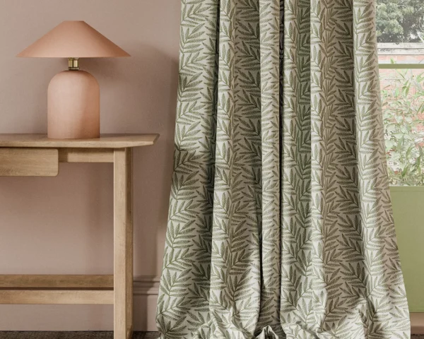 Virgata Fabric - Fern by green botanical curtain with side table and lamps