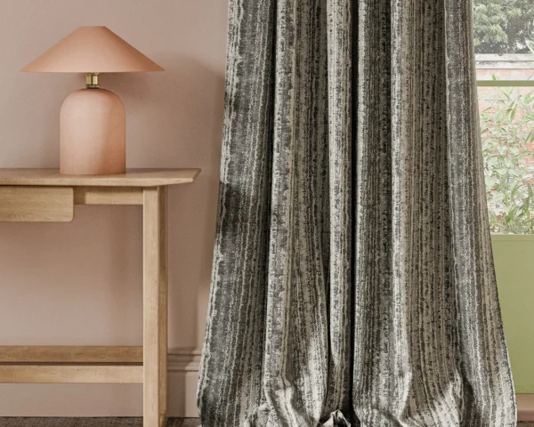 Striatus Fabric - Charcoal by black-grey striped curtain with side table and lamps