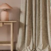 neutral botanical curtain with side table and lamps