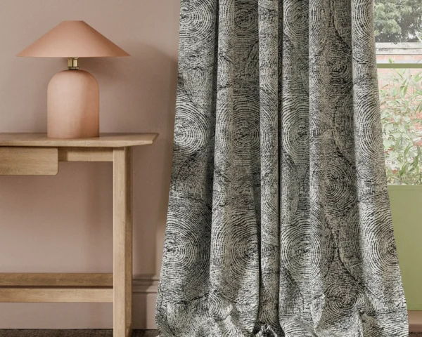 Silvan Weave Fabric - Charcoal by black-grey botanical curtain with side table and lamps